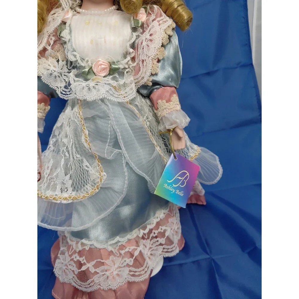 Vintage Ashley Belle Porcelain Doll Dark Blonde Hair Green Eyes Blue & Floral